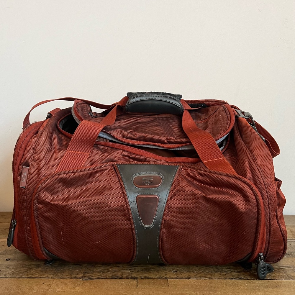 Tumi t-tech duffle in burnt orange